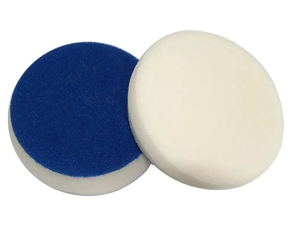 Two round car polishing foam pads, one blue and one white, on a white background