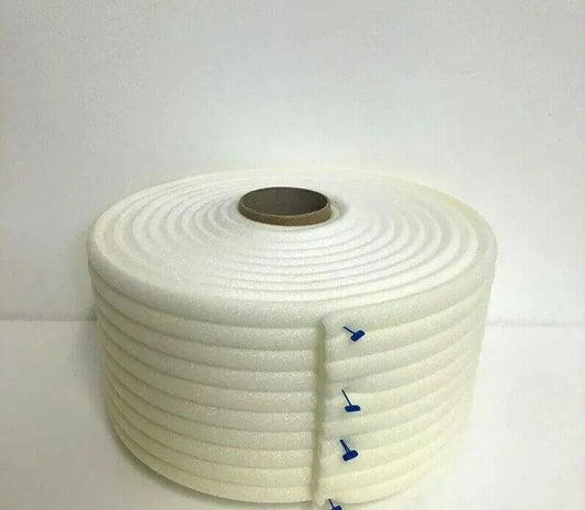 Large roll of white premium foam masking tape with blue tabs on plain white background