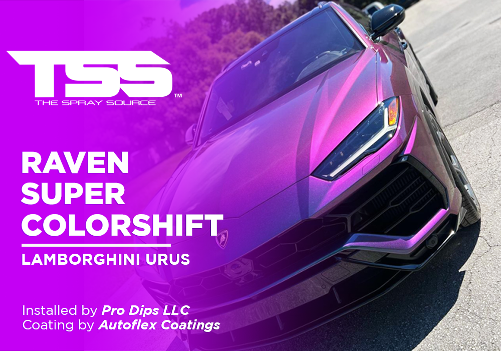 Front view of a purple Raven Super Colorshift Lamborghini Urus parked on asphalt under daylight