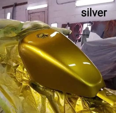 Golden limeade candy pearl motorcycle gas tank painted with Tamco basecoat in a spray booth