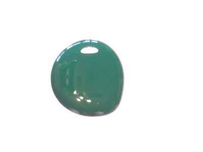 Glossy green paint droplet on white background with reflections